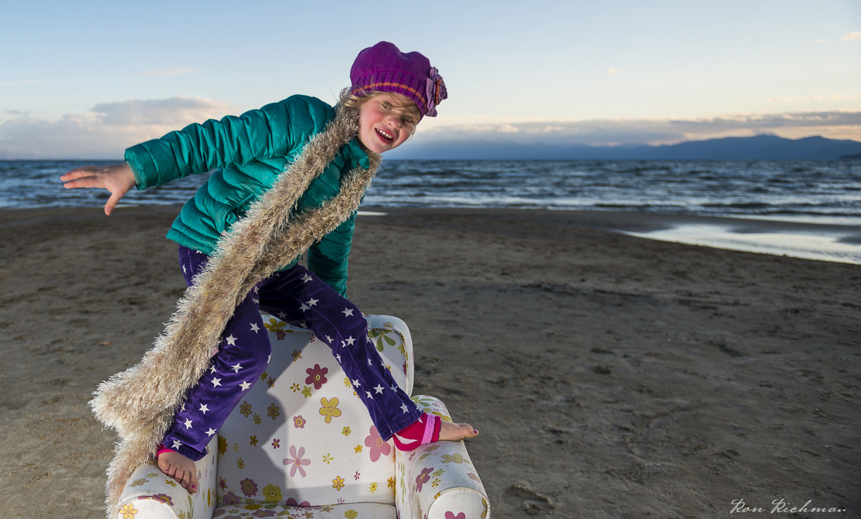 Master Photographer Ron Richman photographed gorgrous model Kid with great smile on the beach. Amazing lighting. Clear. Sharp. Photography.