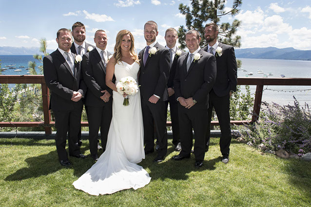 Boston Wedding Photographer Ron Richman takes a Beautiful portrait of the Bride and the grooms men on the lawn at Lake Tahoe in the sun.