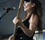 Master Photographer Ron Richman photographed these muscians and singers at the Concerts At Commons Beach. Close up of bass player Nixie.