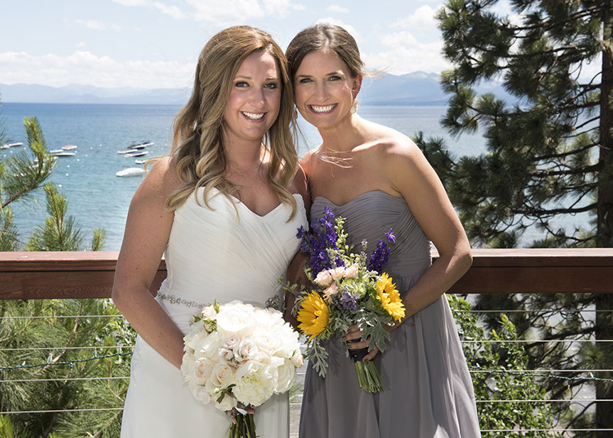 Boston Wedding Photographer Ron Richman photographs the Bride and her best brides maid on the lawn with Lake Tahoe in the background. 