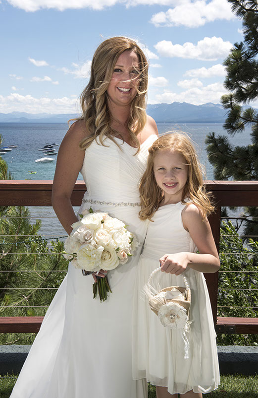 Boston Wedding Photographer Ron Richman photographs the Beautiful Bride and a gorgeous young girl on the lawn at Lake Tahoe.